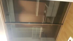 Armadio Cabina armadio con ante scorrevoli vetro brunito con attrezzatura interna legno e bianco  di Novamobili A PREZZO SCONTATO 60%