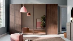 Armadio con ante scorrevoli moderno Armadio a 4 ante scorrevoli mod.trio con ante centrali a specchio bronzato in promo-sconto del 40% Orme a prezzo scontato