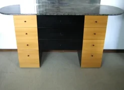 Comò noce e laccato nero scontato del 59%