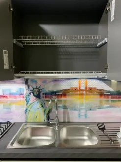 Cucina Colombini casa moderna lineare grigia in laminato opaco Quadra gola