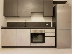 Cucina lineare in laminato materico grigio Evolution a prezzo scontato