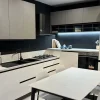 Cucina Mobilturi moderna ad angolo bianca in laminato materico Newmeg