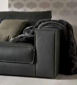 Divano con penisola pelle in misto piuma  Md work a prezzo Outlet