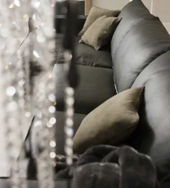 Divano con penisola pelle in misto piuma  Md work a prezzo Outlet