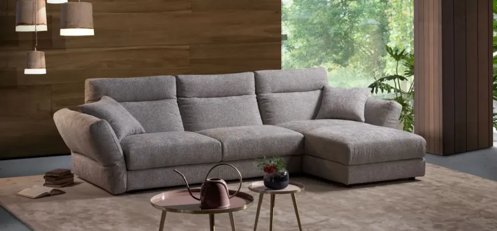 Divano Excò Divano mod.silky rovestito in tessuto con movimento relax in promo-sconto del 50% PREZZI OUTLET sconto 45%