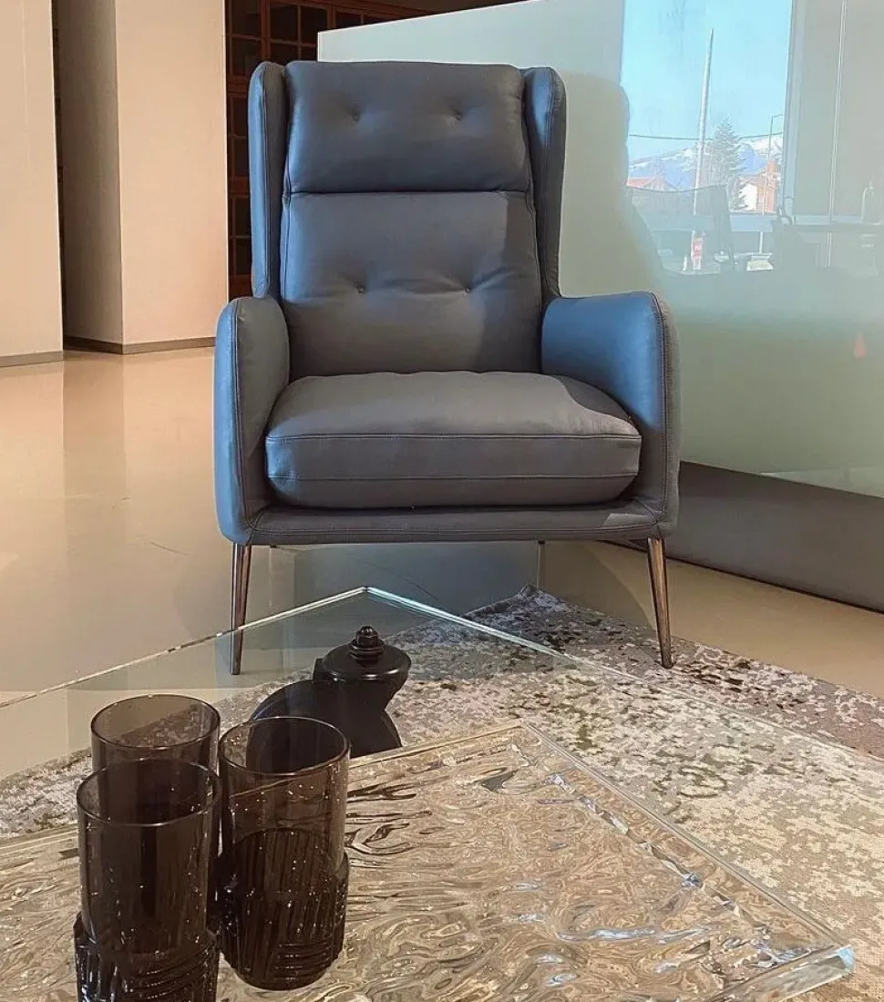 Poltrona con seduta fissa Aftereight Natuzzi a prezzo scontato