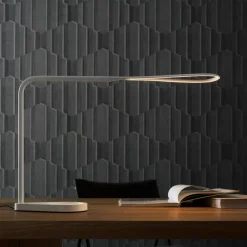 Scopri la Lampada da tavolo Kinx Fontana Arte a prezzo scontato!