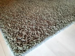 Tappeto moderno Move marrone Artigianale a prezzo scontato